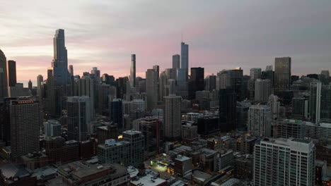 Aerial-view-over-the-Near-north-side-cityscape,-sunrise-in-Chicago,-Illinois,-USA