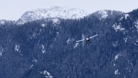 Sea-Plane-Flying-Towards-Mountains-in-Wintertime