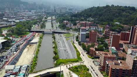Tilting-drone-shot-reveling-Pueblo-Paisa-and-busy-Medellin-city-center