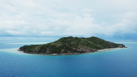 Fiji-Drone-lost-at-Castaway-Island-Wilson-on-holiday-surf-paradise-Nadi-resort-dry-season-Coral-reef-aqua-deep-blue-scenic-sunny-beautiful-relaxing-volleyball-aerial-cinematic-forward-pan-up-movement
