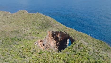 Cliff-And-Majestic-Ocean,-Cabo-Cabron-National-Park-"The-Three-Doors"-In-Samana,-Dominican-Republic---aerial-shot