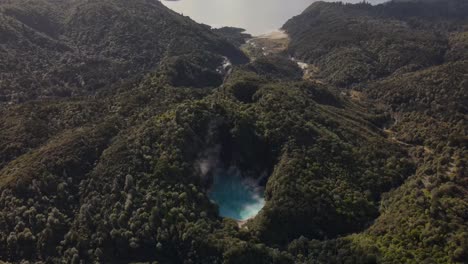Inferno-Crater-Lake-With-Lake-Rotomahana-In-Waimangu,-New-Zealand