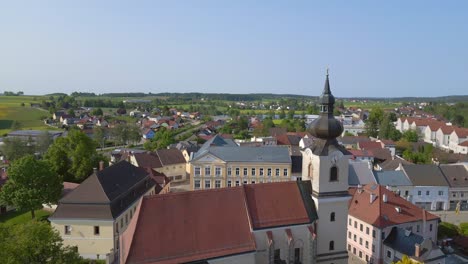 Best-aerial-top-view-flight-Church-in-village-Heidenreichstein,-city-in-Austria-Europe,-summer-day-of-2023