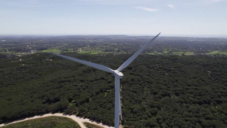 Aerial-rising-shot-of-wind-turbine-in-remote-area