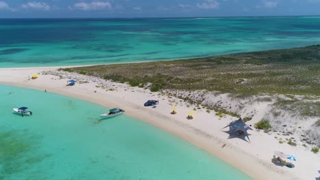Drone-shot-Summer-caribbean-vacation,-escape-to-tropical-island-cayo-de-agua,-Los-Roques