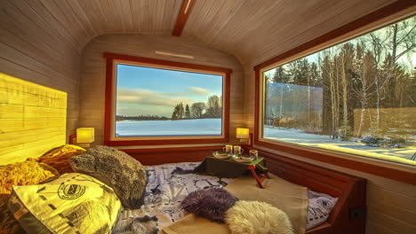 Watching-the-winter-landscape-from-inside-a-cozy-cabin-trailer---time-lapse