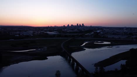 Epic-Aerial-Footage-of-Calgary's-Industrial-District-at-Golden-Hour,-Seen-from-Above