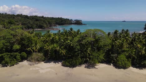 Drone-aerial-view-of-tropical-deserted-paradise-beach,-Manuel-Antonio,-Costa-Rica
