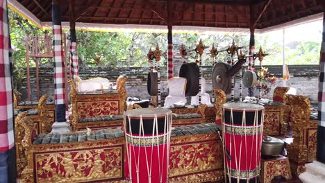 Gamelan-Musical-Instruments,-Orchestra-Displayed-in-Temple-Ceremony-of-Bali-Indonesia,-Colorful-Percussion-Gongs-and-Drums