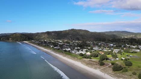 Aerial-of-beach-settlement-of-Matarangi,-Coromandel-Peninsula