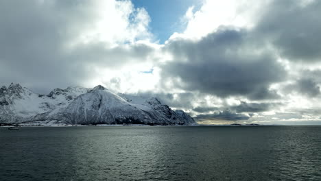 Dramatic-View-Of-Winter-Rock-Mountains-With-Cloudscape-Sky-In-Lofoten-Islands,-Norway