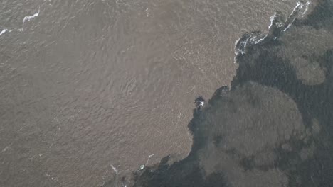 Water-Confluence-Between-Tapajós-and-Amazon-River-in-Brazil,-Aerial-Drone-Fly-Above-Clearwater-Source-Stream