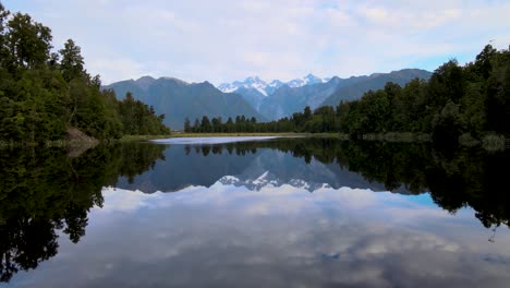Reflection-of-snow-capped-iconic-mountains,-New-Zealand