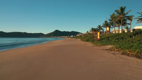 Brazilian-paradise-beach-drone-shot-near-the-sand,-Mariscal-Beach,-Santa-Catarina,-Brazil