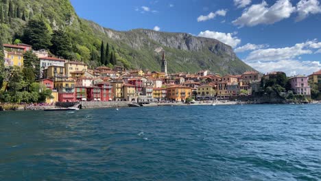 Epic-view-from-boat-of-picturesque-and-colorful-Italian-village-of-Varenna,-Como-lake