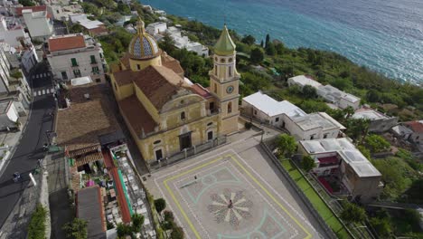 Stunning-Chapel-with-ornate-inlays-overlooks-beautiful-Amalfi-coast,-sunny-day