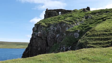 Duntulm-Castle-on-the-top-of-rocky-hill-in-nich-sunny-weather,-Isle-of-Skye,-Scotland,-UK