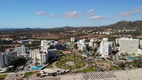 Aerial-View-of-Hotels-at-Beachfront-of-Cala-Millor,-Mallorca,-Mediterranean-Sea,-Spain