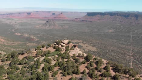 Aerial-flight-to-campsite-viewpoint-on-canyon-rim-near-Moab-Utah