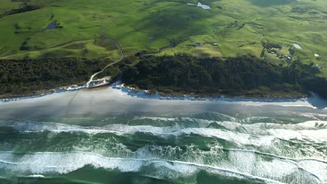 Spectacular-drone-view-of-Rarawa-Beach-in-Northland,-New-Zealand