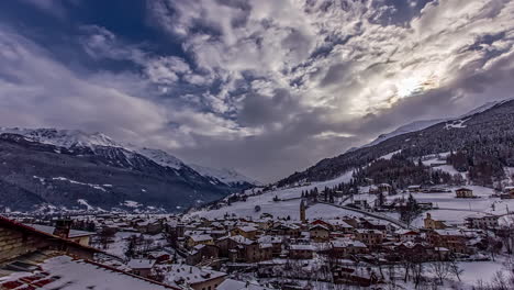 Mountain-valley-village-in-winter---wide-angle-cloudscape-time-lapse