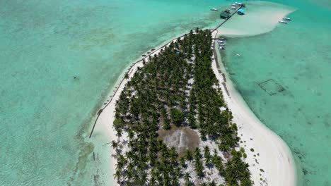 Aerial-overview-of-luxury-Onok-Island-in-Balabac-Philippines,-clear-blue-water