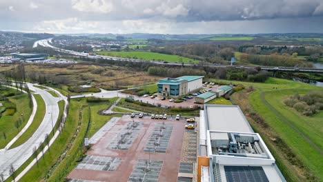 Aerial-cinematic-footage-of-commercial-complex,-trading-estates-in-the-city-of-Wakefield