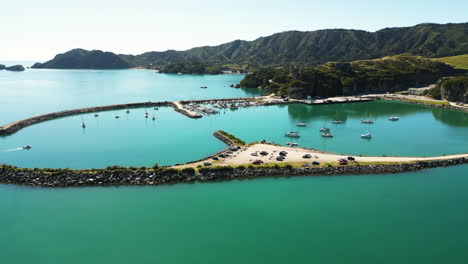 Aerial-view-of-some-boats-safely-docked-on-Port-Tarakohe,-New-Zealand