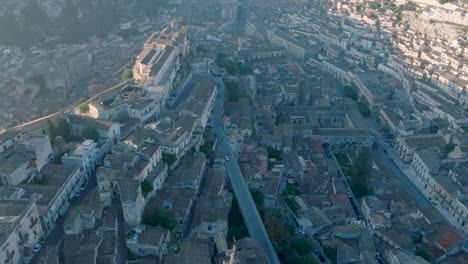 Aerial-view-of-Modica-Alta-Val-di-Noto-Sicily-Old-Baroque-Town-and-Castle-South-Italy