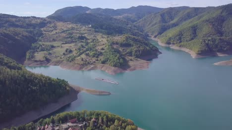 Incredible-4k-tilting-shot-of-blue-Lake-Zaovine-and-green-Tara-mountain
