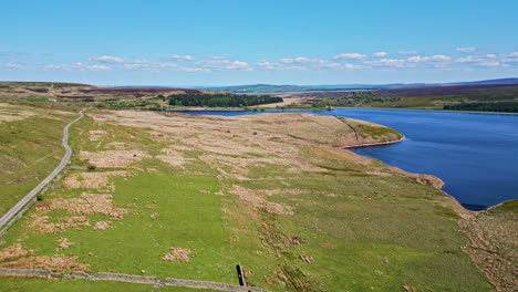 Winscar-Reservoir,-located-in-picturesque-Yorkshire,-becomes-a-stunning-venue-for-a-sailing-event