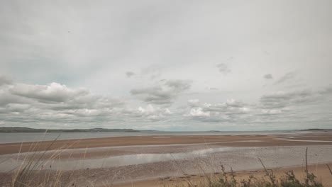 Time-lapse-of-fast-moving-clouds-over-the-Firth-or-Forth-Sea-inlet-near-Edinburgh-in-Scotland