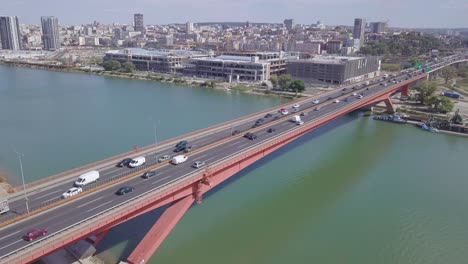 Slow-aerial-panorama-shot-of-Gazela-bridge-and-Waterfront-in-Belgrade-city-centre