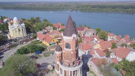 Ascending-4k-aerial-shot-of-Gardos-Tower-in-Zemun-Danue-river-background