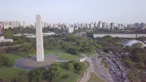 Skyline-of-Sao-Paolo-with-landmark-near-Ibirapuera-park-and-Avenida-Paulista--aerial-descending-shot