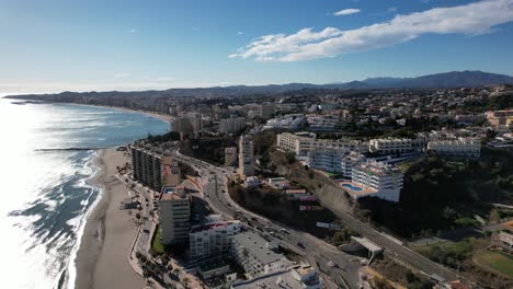 Fuengirola-offers-a-stunning-bird's-eye-view-of-beautiful-landscapes,-with-the-city-situated-in-close-proximity-to-the-water-and-the-atmosphere-filled-with-delightful-warm-sunshine