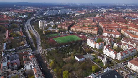 Wonderful-aerial-top-view-flight-Berlin-City-Soccer-football-field,-district-Steglitz-Germany