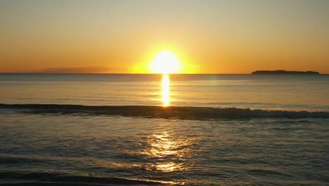 Romantic-golden-sunrise-at-the-beach