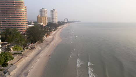 Aerial-View-of-a-Beach-in-Hua-Hin,-Thailand-with-Hotels-and-Apartments