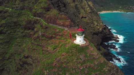 Stunning-Aerial-Shot-of-Makapu'u-Lighthouse-on-Mountain-in-Oahu,-Hawaii