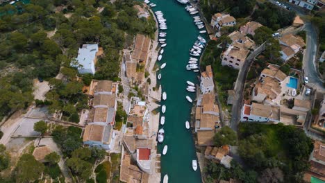 Sailing-ship-marina-with-blue-turquoise-clear-sea-water,-boats-and-hotels,-Palma-de-Mallorca-Island