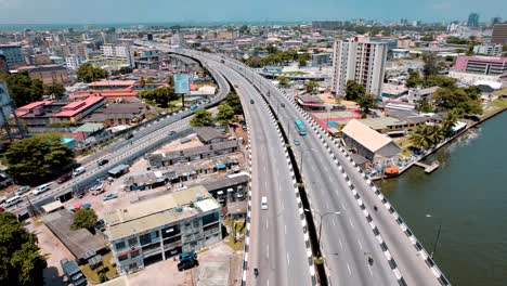 Ikoyi-Victoria-Island,-Lagos-Nigeria--April-10-2023:-Cityscape-of-Ikoyi-along-a-dual-carriage-bridge