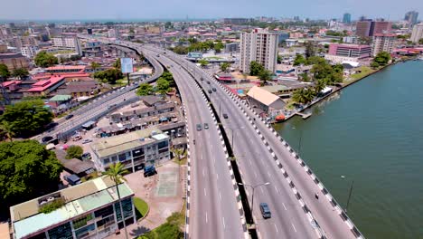 Ikoyi-Victoria-Island,-Lagos-Nigeria--April-10-2023:-Cityscape-of-Ikoyi-along-a-dual-carriage-bridge