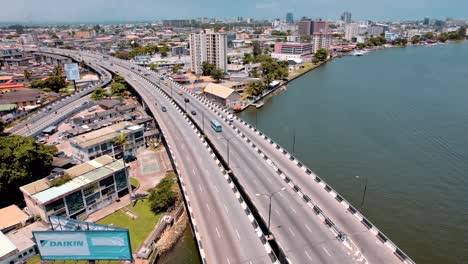 Ikoyi-Victoria-Island,-Lagos-Nigeria--April-10-2023:-Cityscape-of-Ikoyi-along-a-dual-carriage-bridge