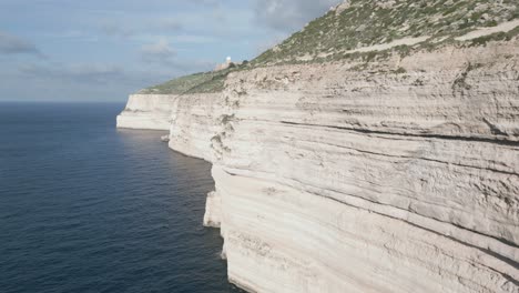 Drone-footage-over-the-sea-at-Malta-island,-next-to-a-beatiful-cliff