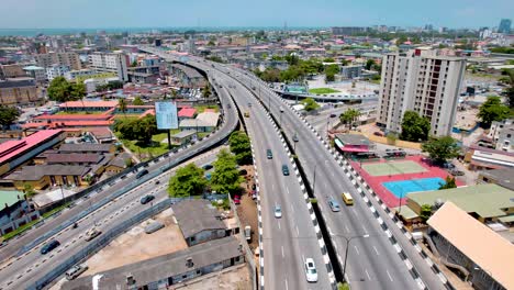 Ikoyi-Victoria-Island,-Lagos-Nigeria--April-10-2023:-Cityscape-of-Ikoyi-along-a-dual-carriage-bridge