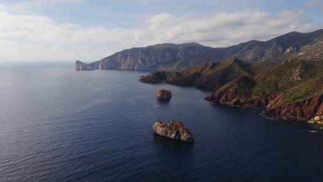 Sensational-Sardinia-coastline-in-Nebida-with-Pan-di-Zucchero-sea-stack,-aerial