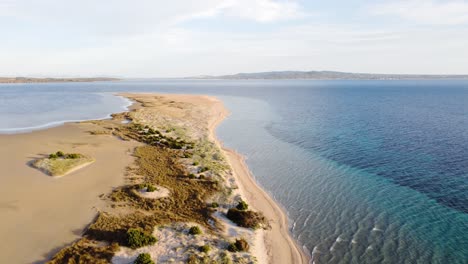 Amazing-aerial-view-of-long-sandy-beach-in-South-Sardinia,-Kitesurf-spot