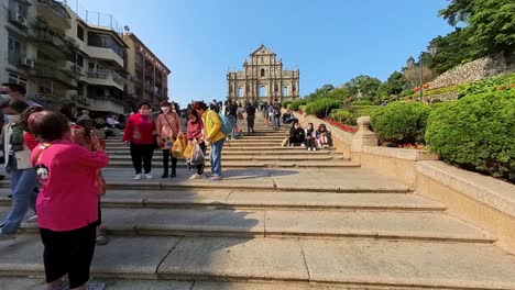 POV-walking-up-the-stone-steps-towards-the-Ruins-of-St-Paul-in-Macau-SAR,-China