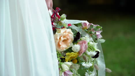 Bride-holding-pretty-flowers